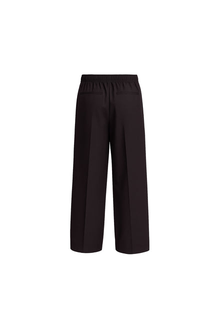 100% Black Wool. Relaxed Fit.
